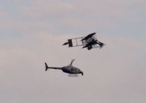 Wright "B" Flyer look-a-like in flight with helicopter